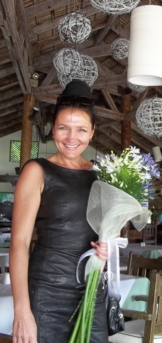 Artist Lana Repina at her art exhibition in the Dominican Republic.