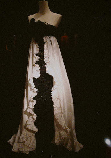 Black-and-white Valentino couture gown featuring dramatic ruffles, displayed at the Valentino retrospective in Rome.