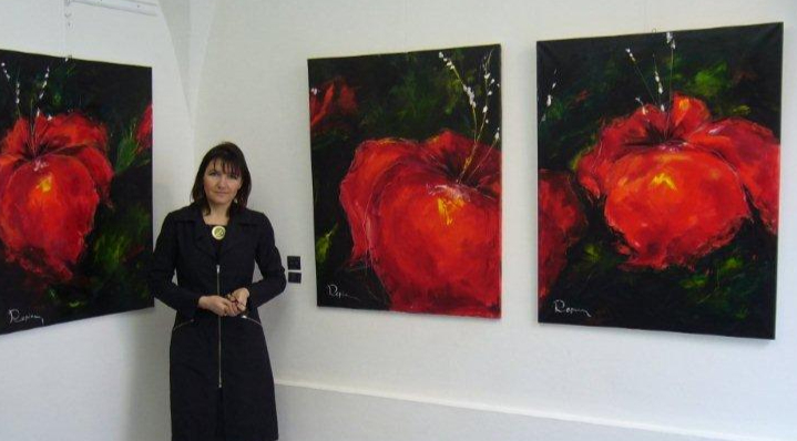Artist Lana Repina at her exhibition in Gamla Stan, Stockholm, Sweden.