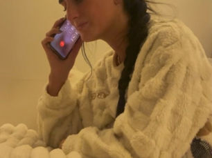 girl on the phone in bed