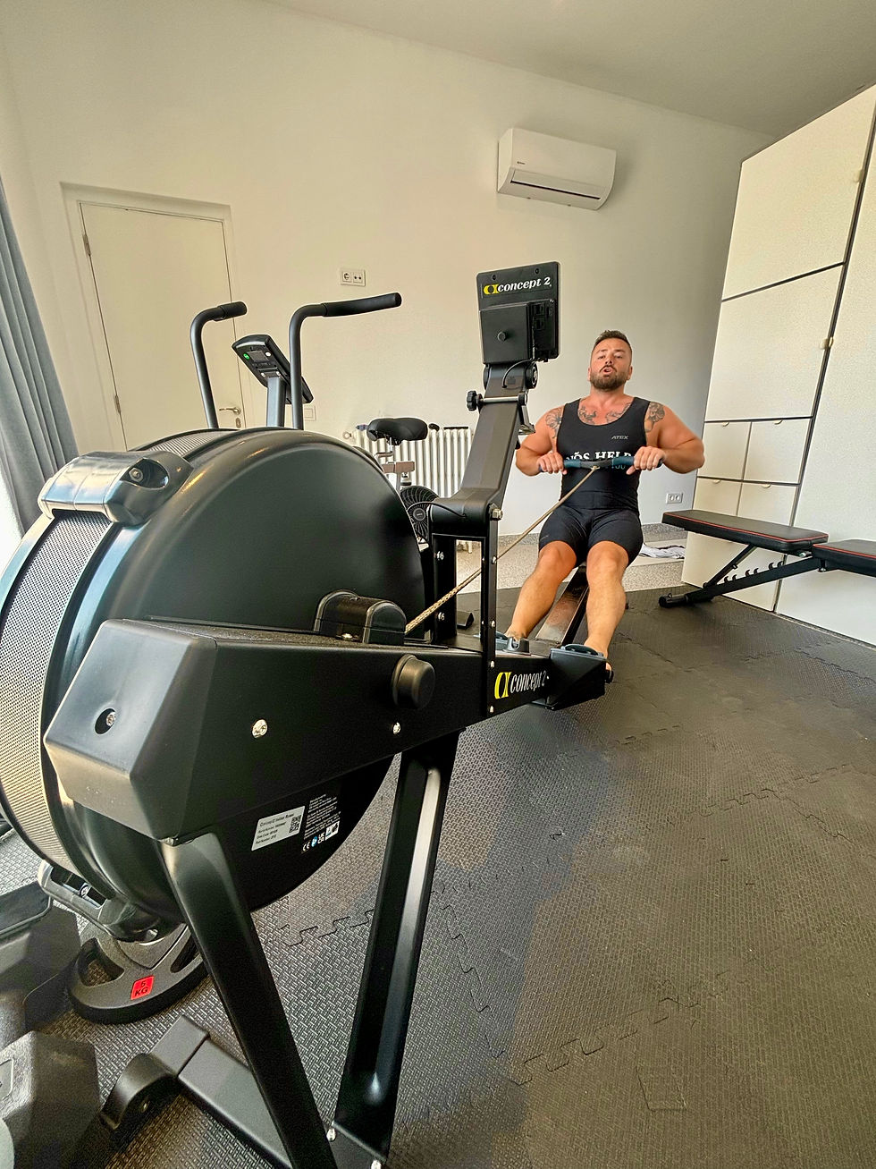Man rowing on an indoor concept 2 rowing machine