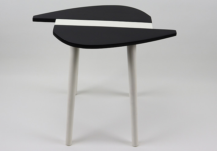 A side table inspired by the Swazi warriors' shield.