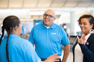 Ontario Ariport Lifestyle Photography of their experience team. Racially diverse group of people smiling, and having fun while at work.
Ontario Photography