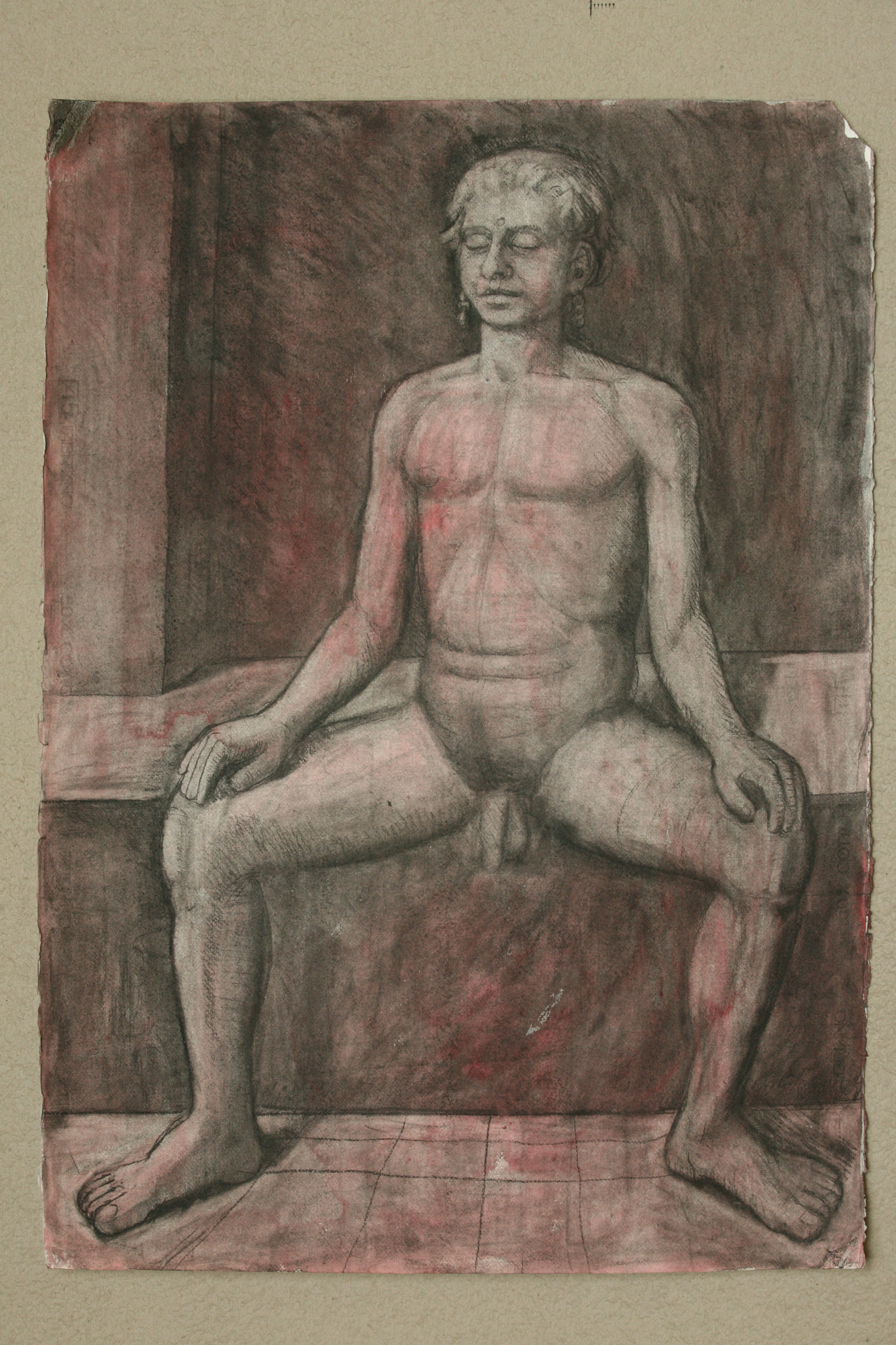 Seated young man.