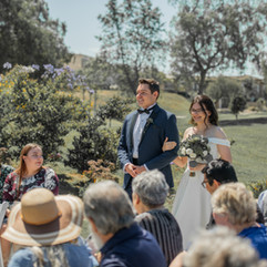 Bride and groom walking down the aisle