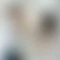 Groom and bride feeding each other cake