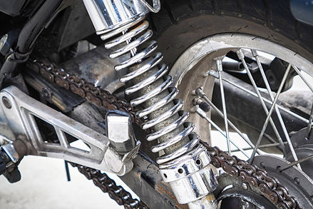 古いバイクのメッキリアサスペンション