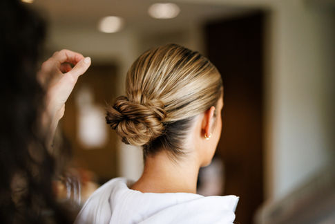 sleek bun bride, classy low bun, clean bun hairstyles, slick bun wedding hairstyles, elegant low bun wedding, clean low bun, simple low bun wedding hair 