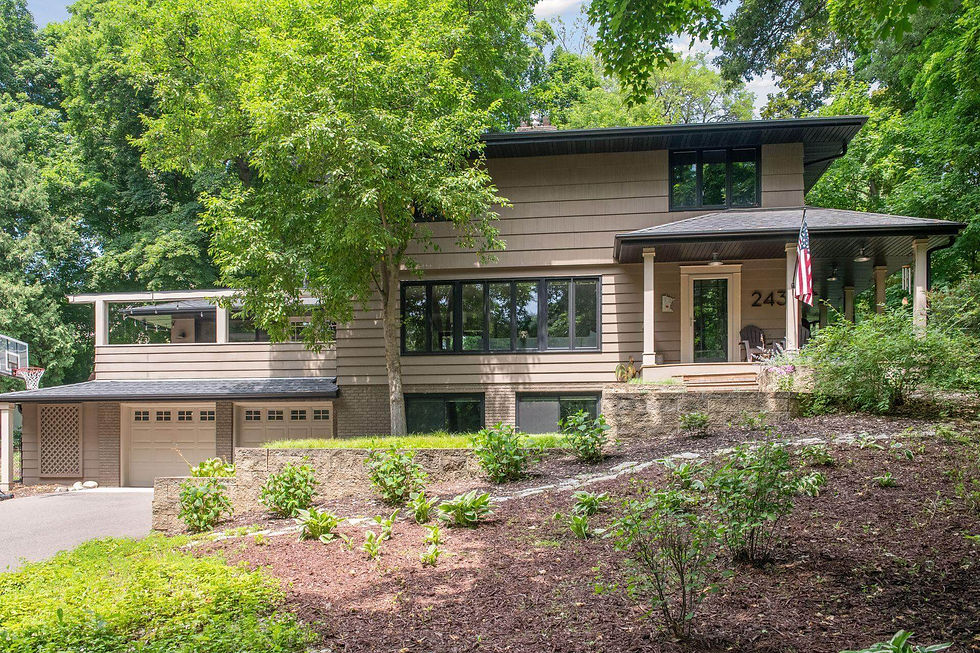 Window replacement by Lakeside Exteriors on a Wayzata, Minnesota home featuring new energy-efficient windows and updated exterior styling.
