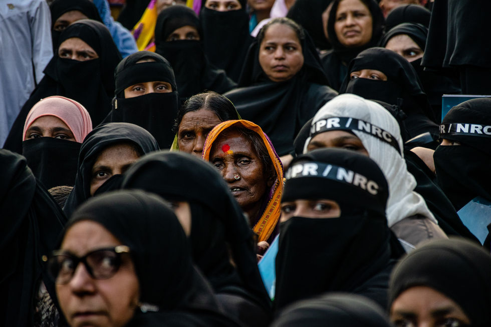 omen participate in a protest against a new citizenship law
