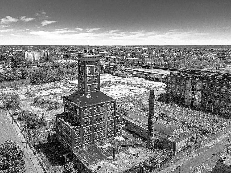 Black and white aerial documentation of the Remington Shot Tower and surrounding industrial site in Bridgeport, Connecticut, April 2020.