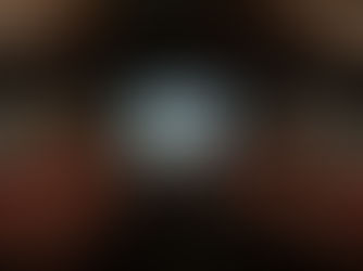 Empty Bijou Theatre in Bridgeport with the Barnum Museum documentary projected on the main screen during pre-screening setup before the audience arrived.