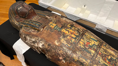 Ancient Egyptian mummy coffin artifact displayed during research study at the Barnum Museum in Bridgeport Connecticut
