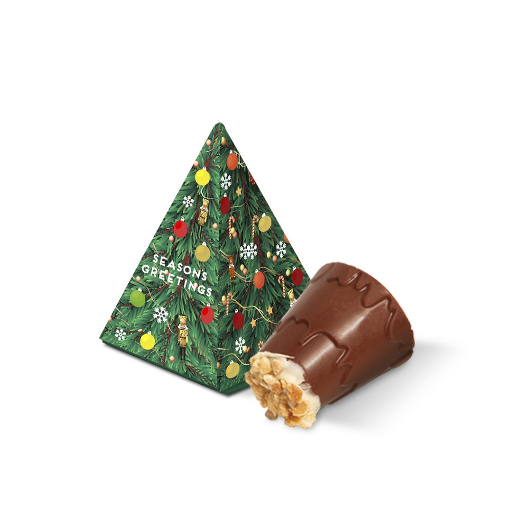 A plastic free, eco tree box filled with 1 Mallow Mountain. A chocolaty mountain covering a fluffy marshmallow, topped with white chocolate snow and hazelnut rocks.