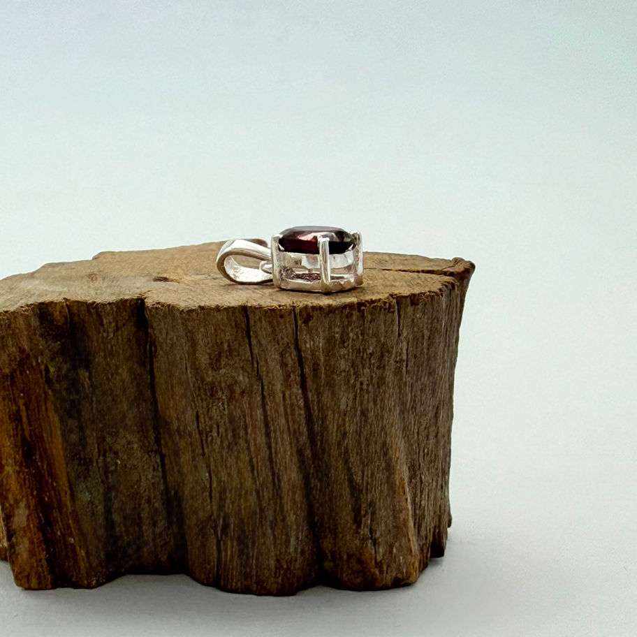 Garnet Oval Claw Set Pendant