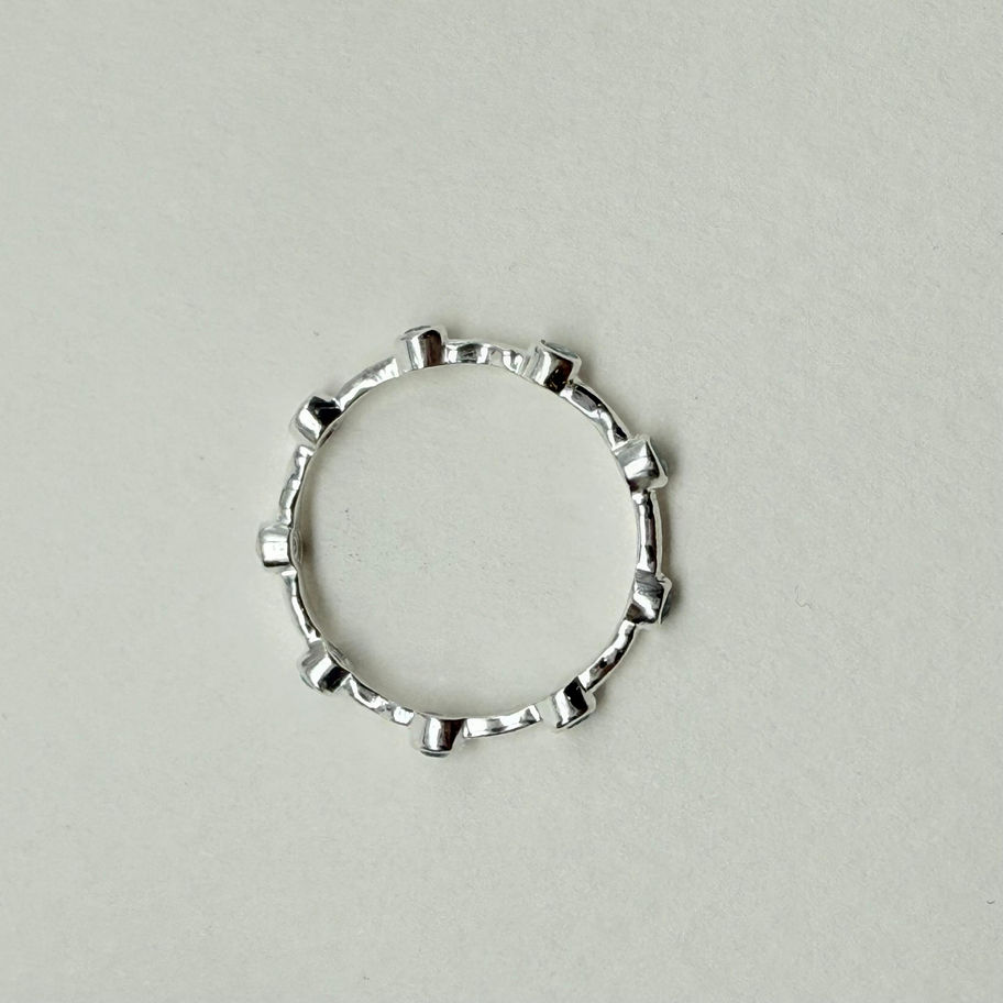 Blue Topaz Spaced Eternity Ring