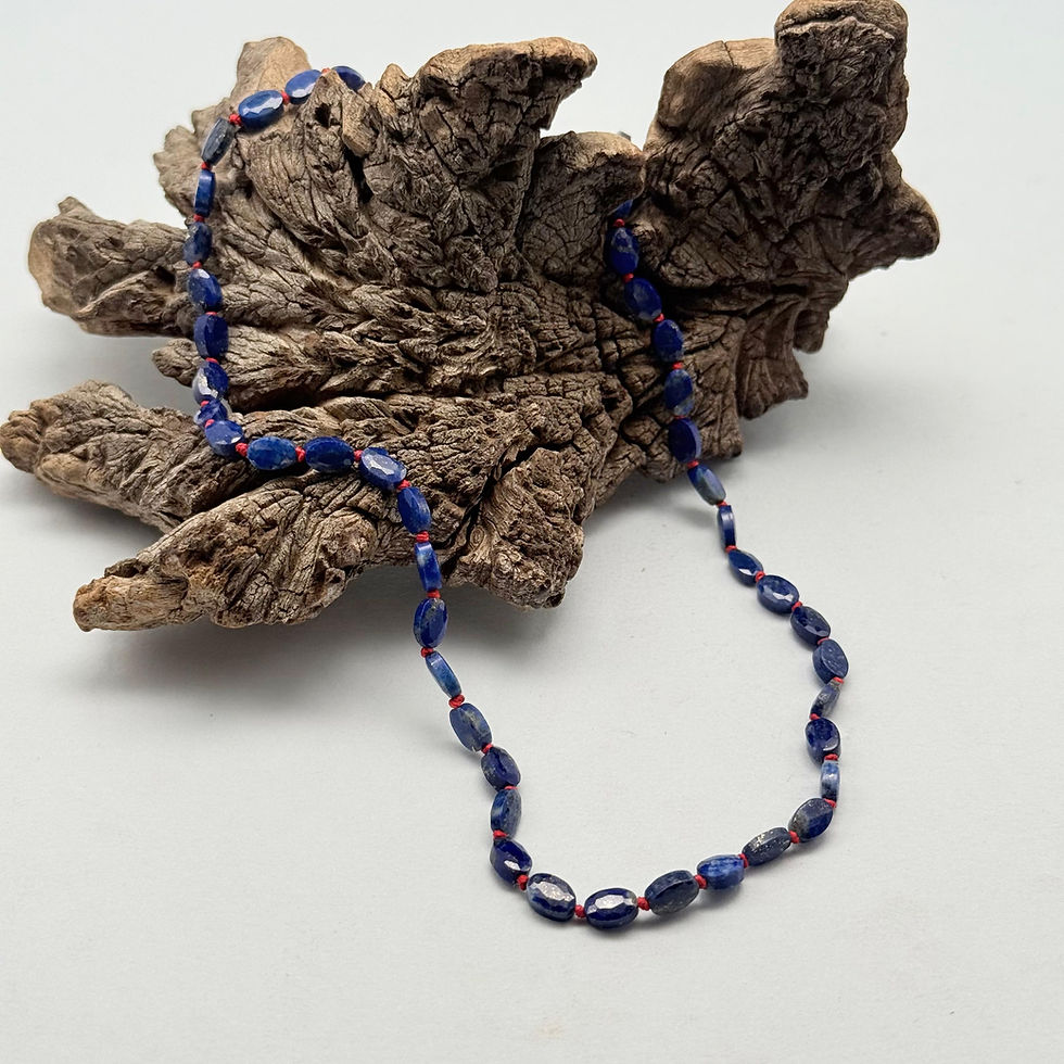 Faceted Lapis Lazuli Bead Necklace on Red String