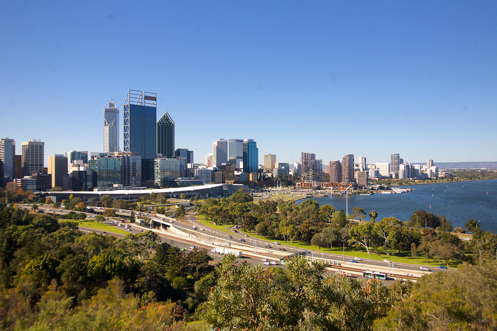 Panoramic Perth city skyline with greenery and Swan River views