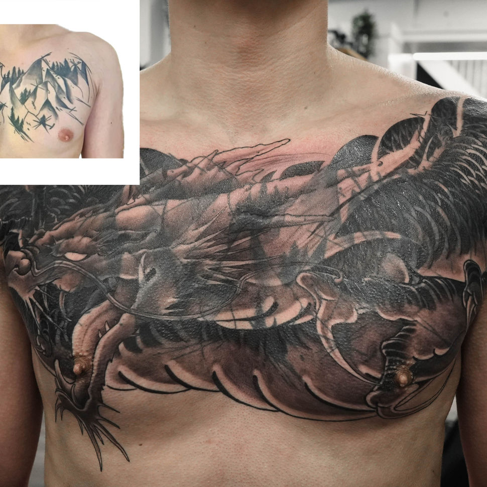 chest tattoo cover up with asian dragon tattoo.