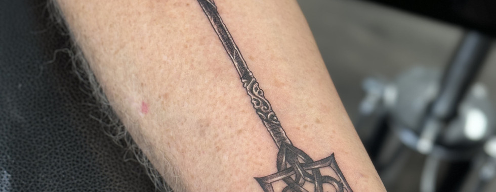 black and grey realism memorial Trident tattoo for father and son