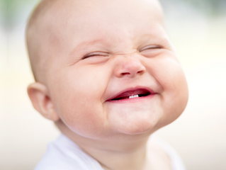Que idade devo levar o meu filho ao dentista??