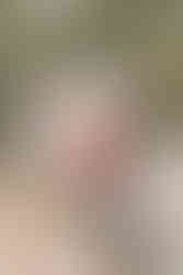 Children climbing rocks together at Oak Riparian Park in Carlsbad, building strength and confidence through supervised risky play.