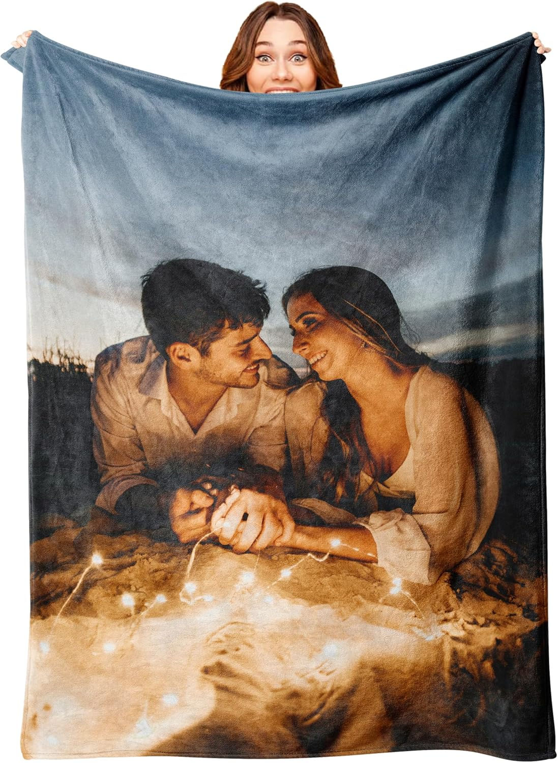 Personalized photograph of a young couple holding hands printed in color on a blanket