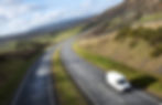 van driving through hillside