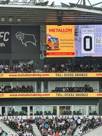 Metallon Derby banners at DCFC match