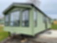 caravan with green cladding