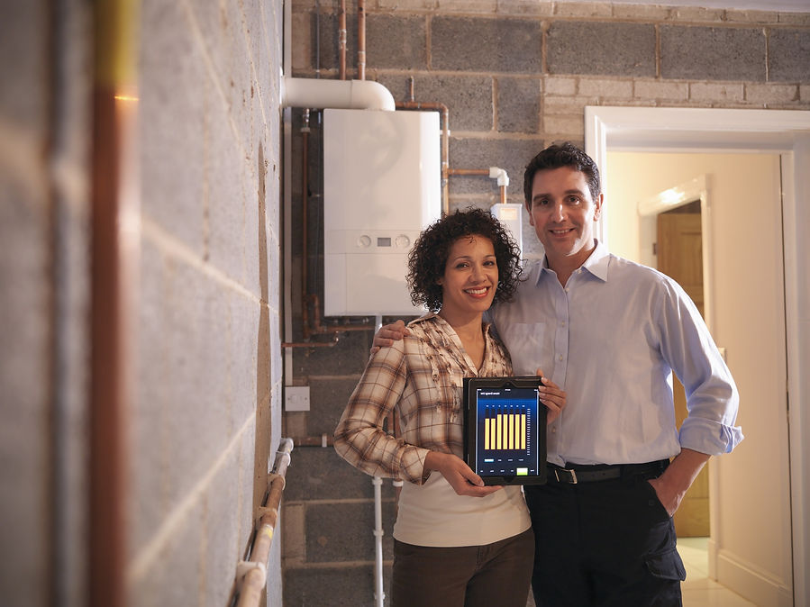 happy couple with new boiler