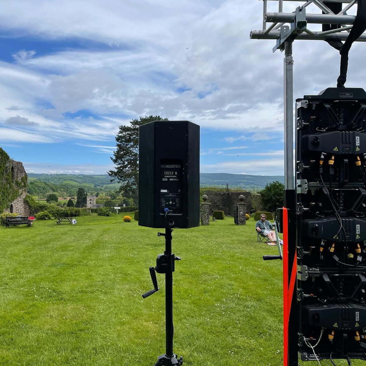 Speakers set up at a historic outdoor site