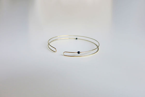 Pas Des Deux, bangle, handcrafted in 18c yellow gold and black glass beads