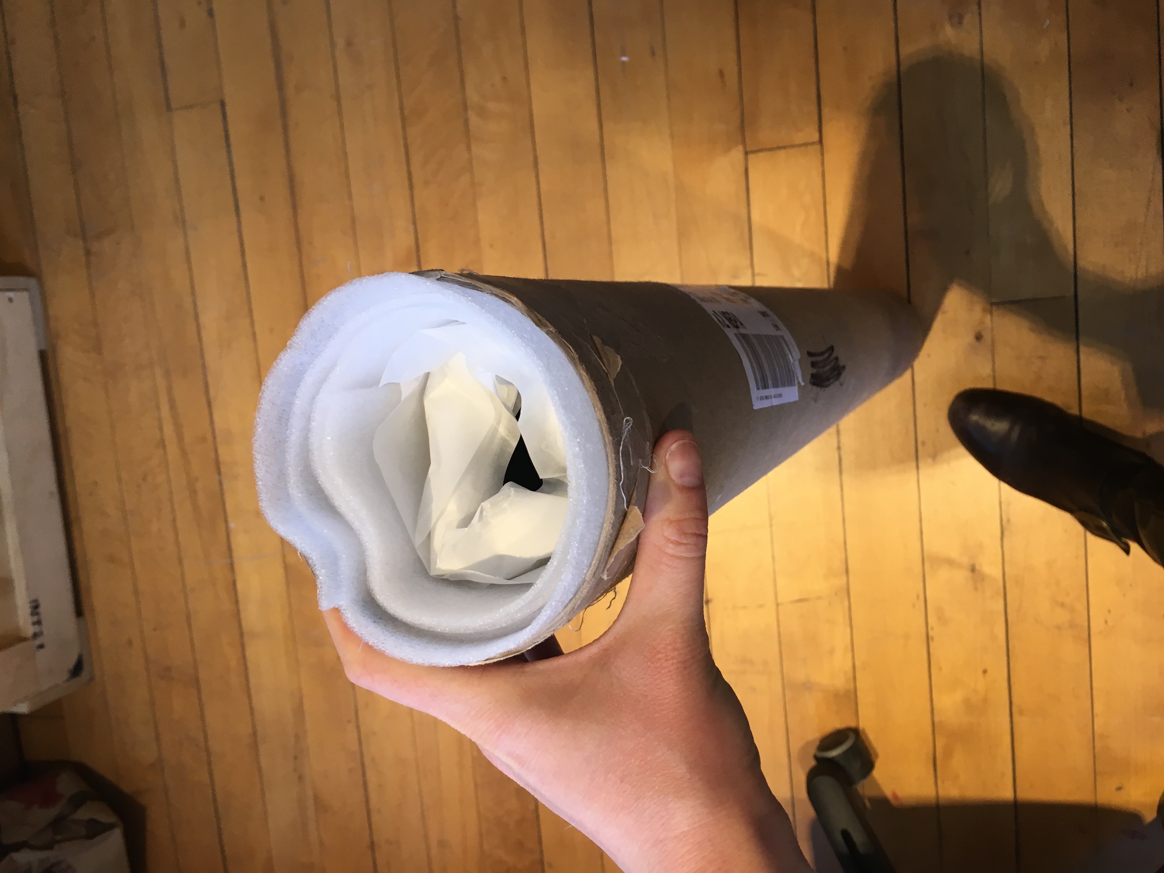 17.Gently fold excess glassine ends