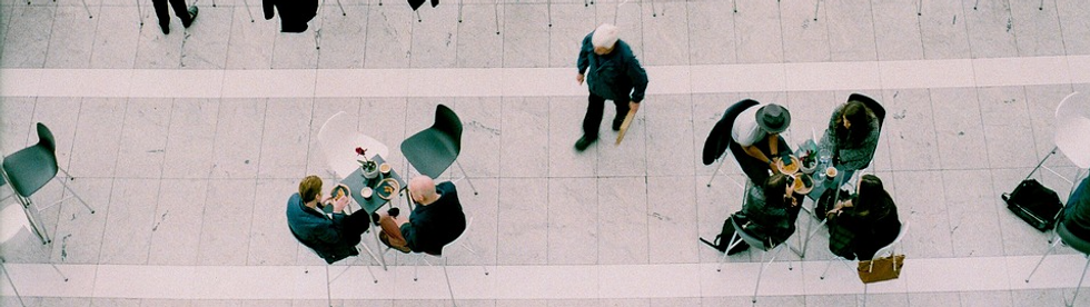 OVERVIEW OF COURTYARD WITH BUSINESSPEOPLE