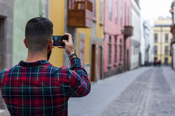 Man street photo smart phone by Josu Ozkaritz.jpg