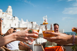 Glass toast on bar terrace by Josu Ozkaritz.jpg