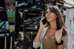Business woman phone talk by Josu Ozkaritz.JPG