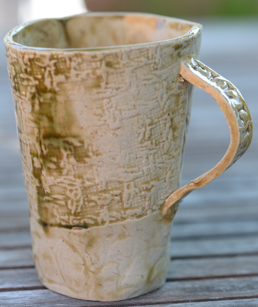Handmade slab-built mug from a Cow Pat Pots workshop