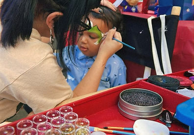 Face painting services by Rainbow Sand Art. A mobile craft party business