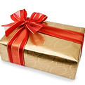 icon holiday donations showing golden gift package wrapped with red bow  