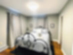Comfy Primary Bedroom with Electric Fireplace and Queen Bed
