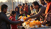 acts-charity-prevalent-makar-sankranti-with-volunteers-distributing-warm-clothes-food-s (2