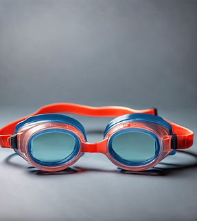swimming goggles on grey background.jpg