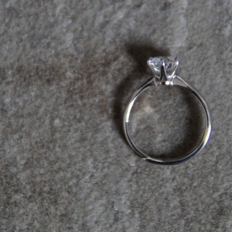 Silver moissanite proposal ring