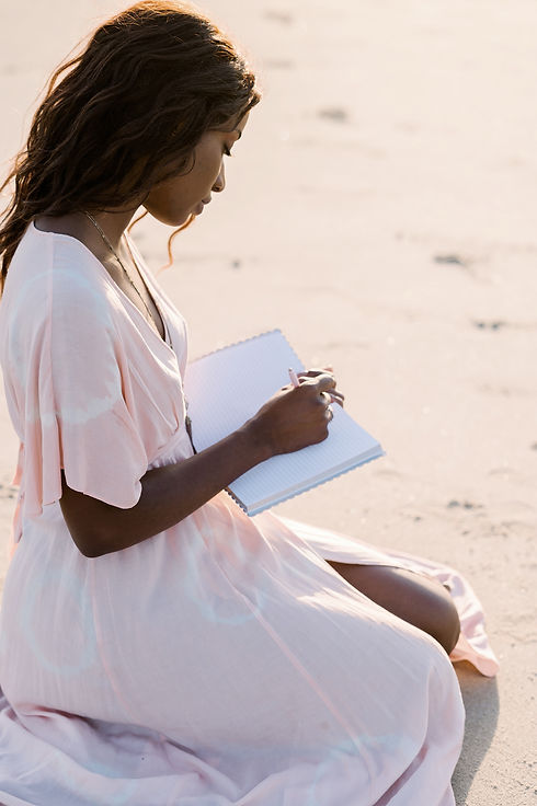 lady writing in her book.jpg