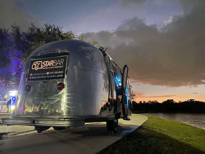 Our vintage Airstream mobile bar rental at dusk