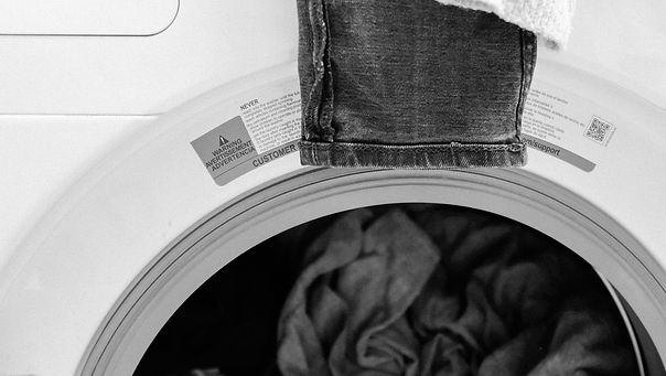 gray and white textile on white front load washing machine_edited.jpg