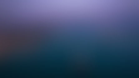 Aerial view of commercial cargo ships navigating narrow maritime waterway at dusk, representing Strait of Hormuz shipping lanes under geopolitical pressure, Persian Gulf region, July 2026