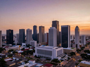 Aerial view of San Salvador skyline at dusk, El Salvador 2026 geopolitical risk assessment, security dividend and sovereign debt